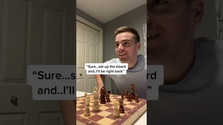 Playing chess with his girlfriend