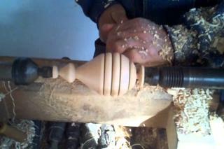 Amish Man Making Wooden Top