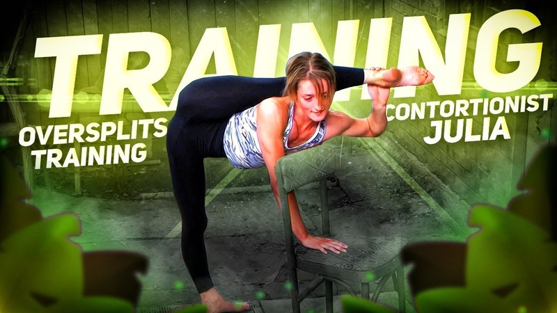 Oversplits stretching. Contortionist Julia doing gymnastics training. Outdoor workout,